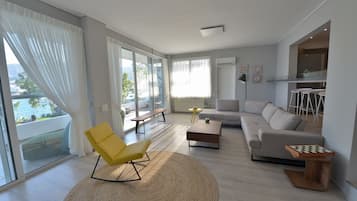 Luxury Villa, 4 Bedrooms, Sea View | Living room | 40-inch flat-screen TV with satellite channels, LCD TV, fireplace