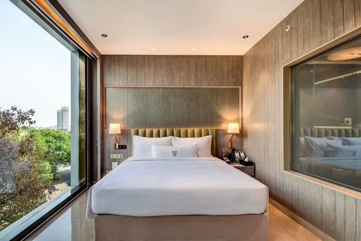 Suite, City View | Premium bedding, minibar, in-room safe, individually furnished