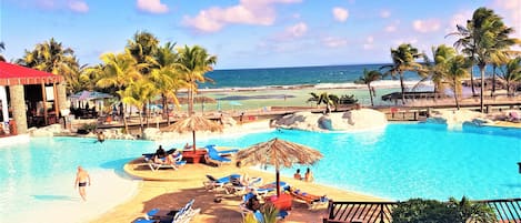 Outdoor pool, open 7:30 AM to 11:00 AM, pool umbrellas, pool loungers