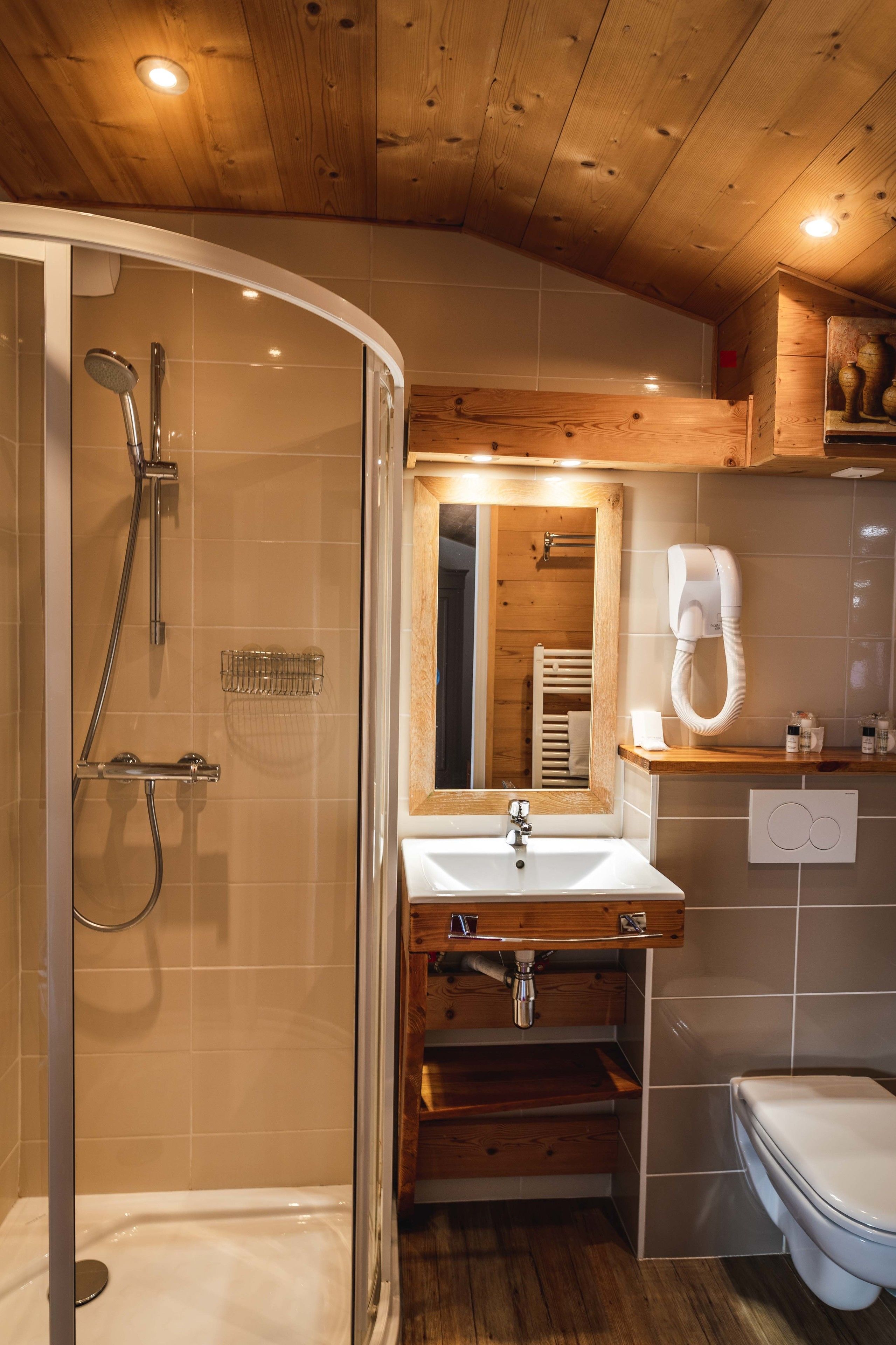 deep-soaking bathtub, free toiletries, hair dryer, bathrobes