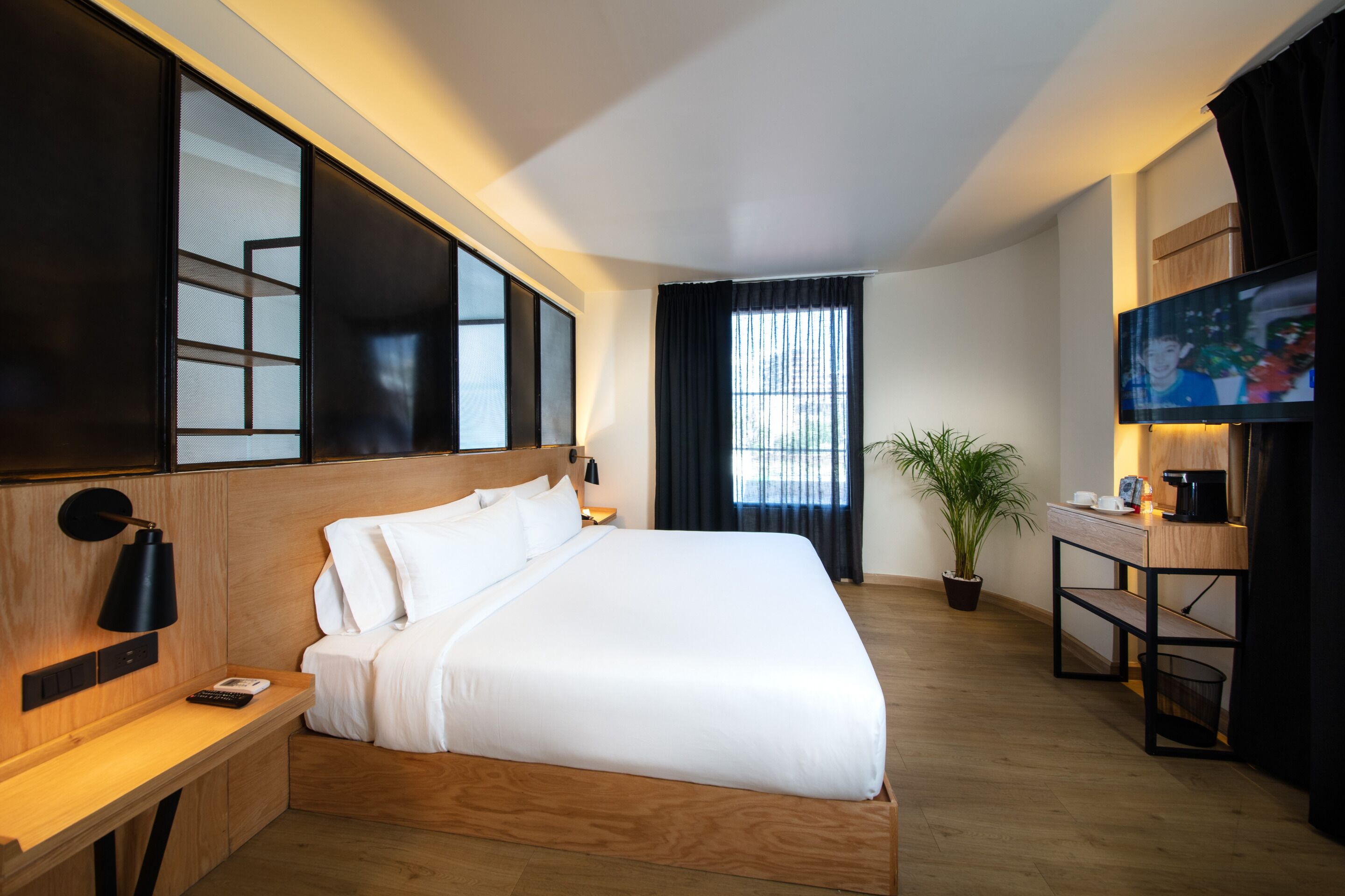 junior room | in-room safe, desk, blackout curtains, soundproofing