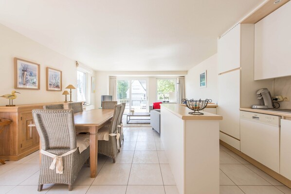 Apartment, 2 Bedrooms (Monet) | Living area | Flat-screen TV, DVD player
