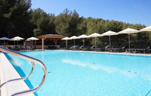 Seasonal outdoor pool, open 9:00 AM to 7:00 PM, sun loungers