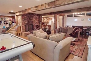 Smart TV, fireplace, DVD player, foosball