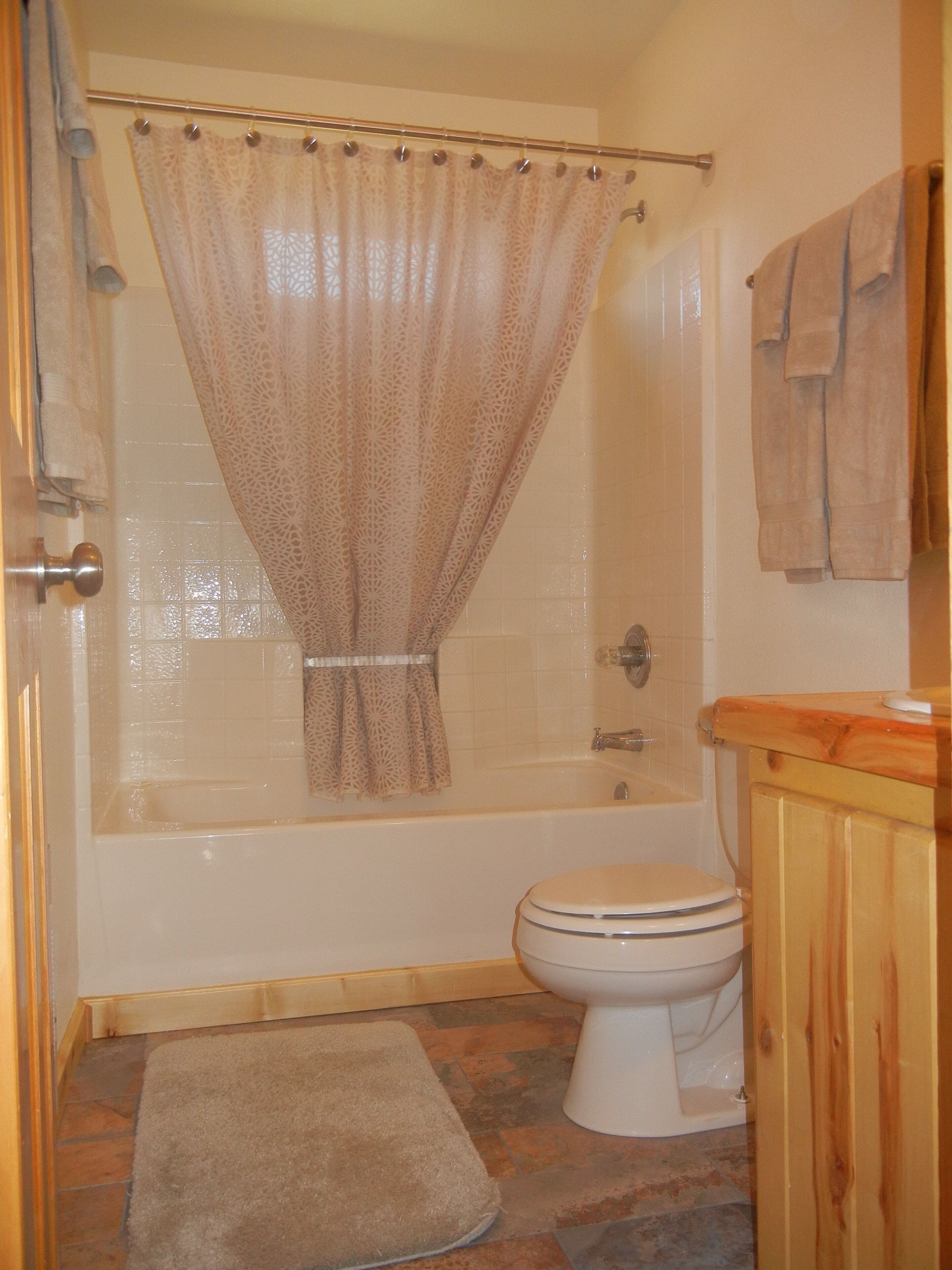 Sunny 2BR/1BA log Cabin on Main Street. Fireplace, stocked trout pond, views!