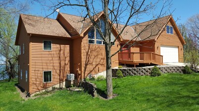 Unique Family Home Overlooking Beautiful Wind Lake With 117' Lake Frontage