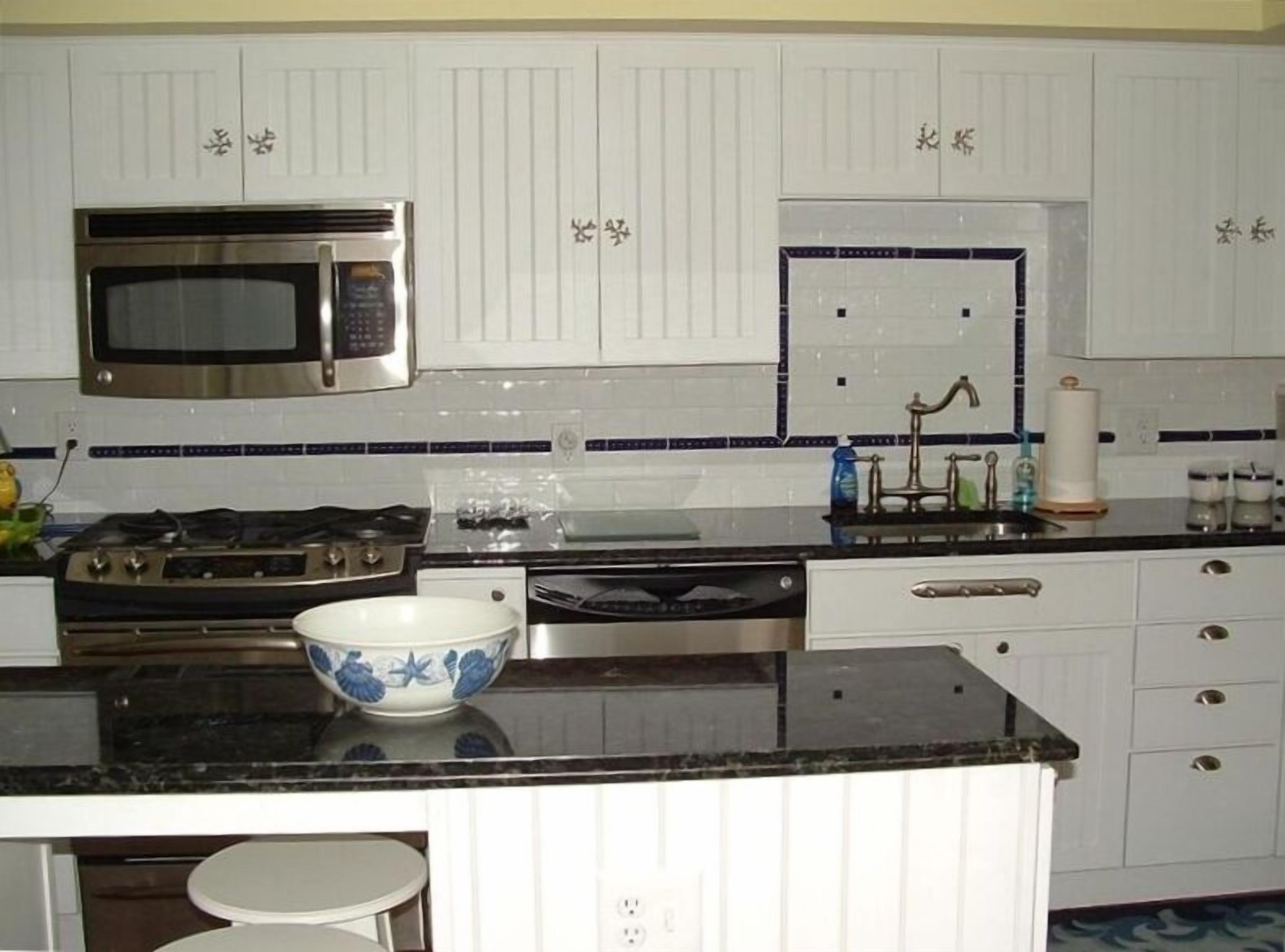 COASTAL ELEGANCE- PREMIER LOCATION - 5 HOUSES TO BEACH-RESIDENTIAL NEIGHBORHOOD