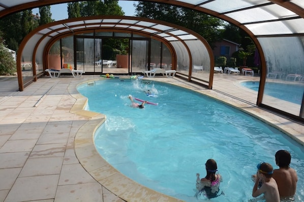 Indoor pool, seasonal outdoor pool, pool umbrellas, sun loungers