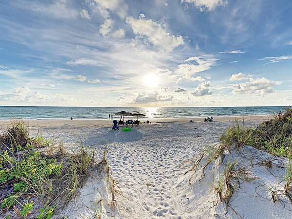 On the beach, sun-loungers, beach towels