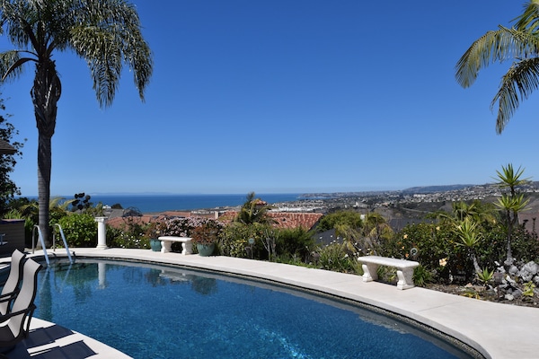 Wide Open Ocean Blue with Solar Heated Pool. Warm and Relaxing.