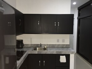 Fridge, microwave, oven, stovetop - Pool view Modern Studio in Cozumel! (Cozumel)