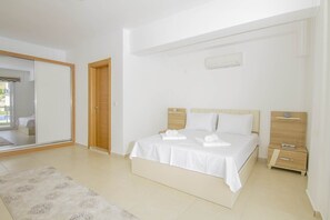 Apartment, 3 Bedrooms | 3 bedrooms, bed sheets