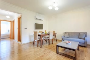 Apartment, 2 Bedrooms | Living area | Flat-screen TV