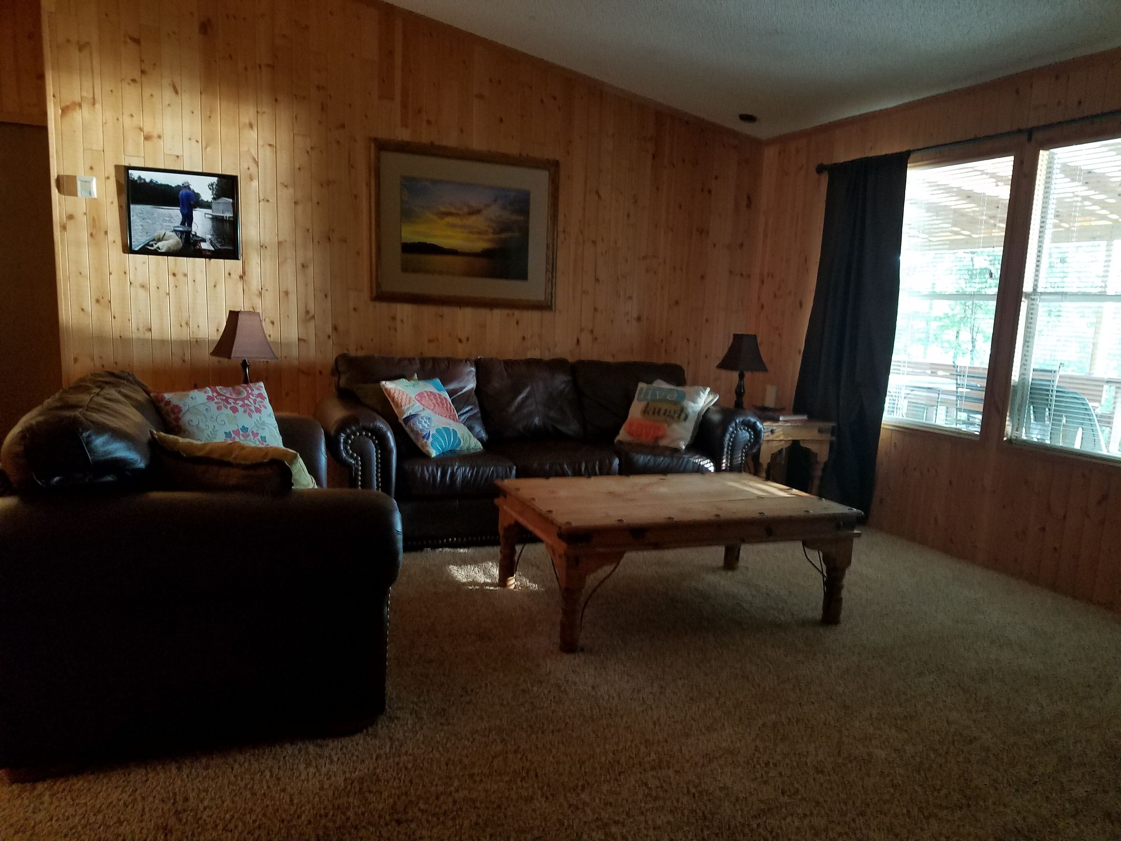 Cozy Lakefront Family Friendly Home With Large Covered Porch And Private Dock.
