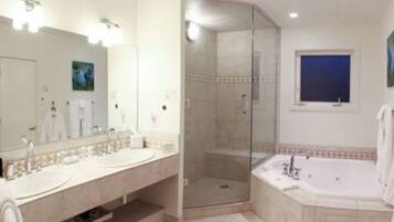 Shower, jetted tub, eco-friendly toiletries, hair dryer