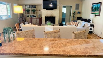 Smart TV, fireplace, DVD player, books