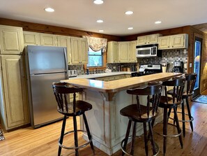 Fridge, microwave, oven, stovetop - Overlook Cabin: E. Bluff Drive, Lake View, Hot Tub, Firepit, Central-AC, Private (Penn Yan)