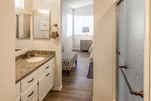 Combined shower/tub, hair dryer, towels, soap