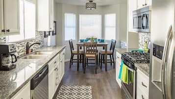 Coffee/tea maker, fridge, microwave, oven