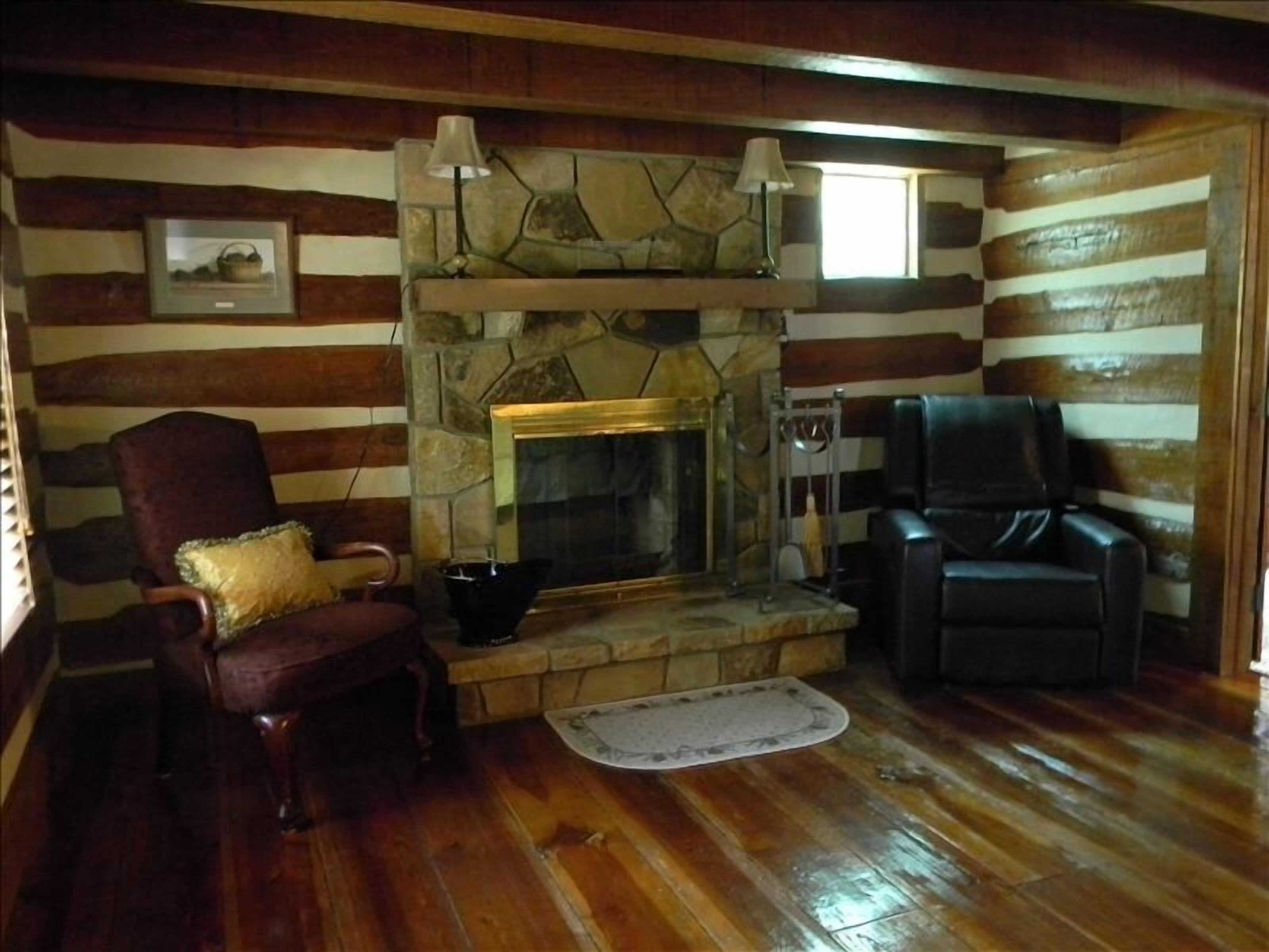 Beautifully appointed log cabin features mountain views, river, trails