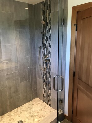 Combined shower/bathtub, hair dryer, towels, soap - Your Basecamp In the Tetons.  (Victor)