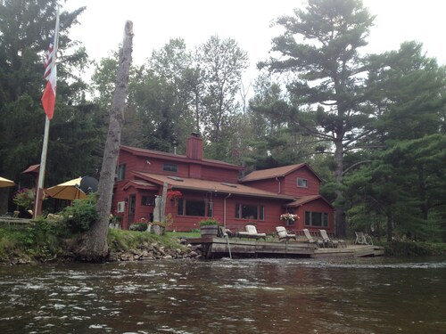 Spacious Riverfront home. 10 Min to TC but far enough away from it all.