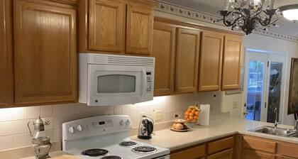 Spacious Riverfront home. 10 Min to TC but far enough away from it all.