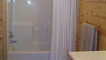 Combined shower/tub, hair dryer, towels, soap