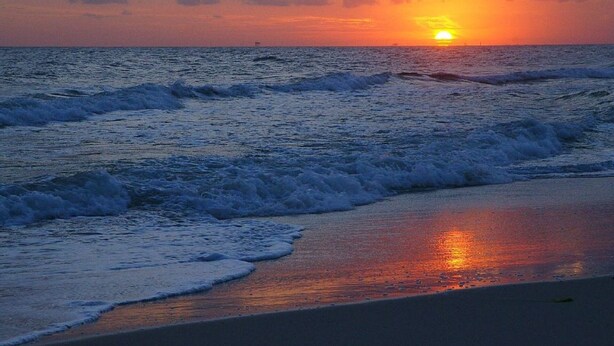 A sunset over the ocean with waves crashing onto the shore. - Gulf Shores Plantation ~ Resort Conference Center #1169  (Gulf Shores)