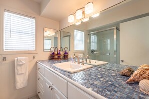 Combined shower/tub, hair dryer, towels, toilet paper