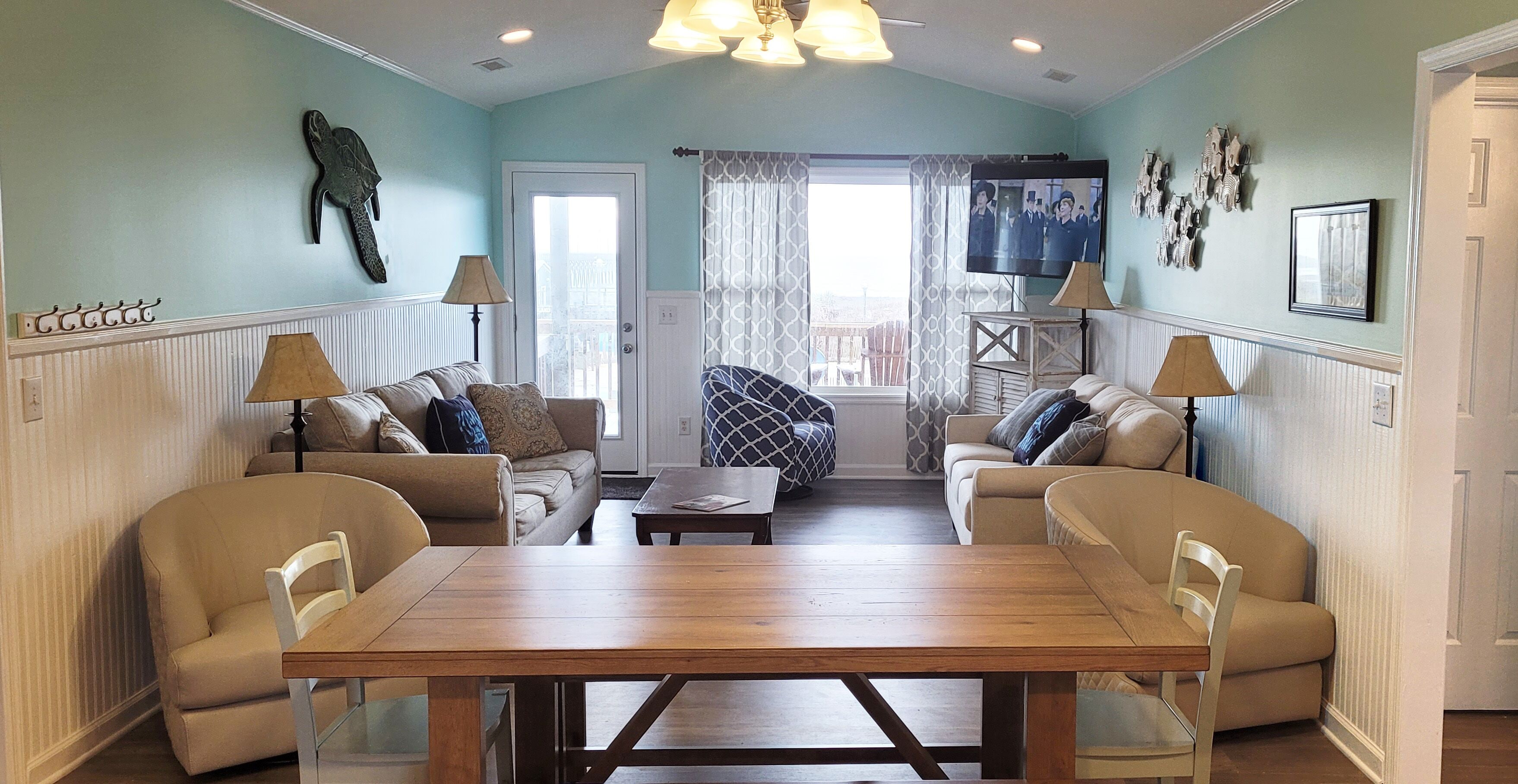 Televisión, reproductor de DVD, libros y estéreo 