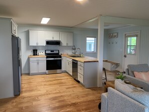 Fridge, microwave, oven, stovetop - Spacious water front property located on Big Green Lake (Green Lake)