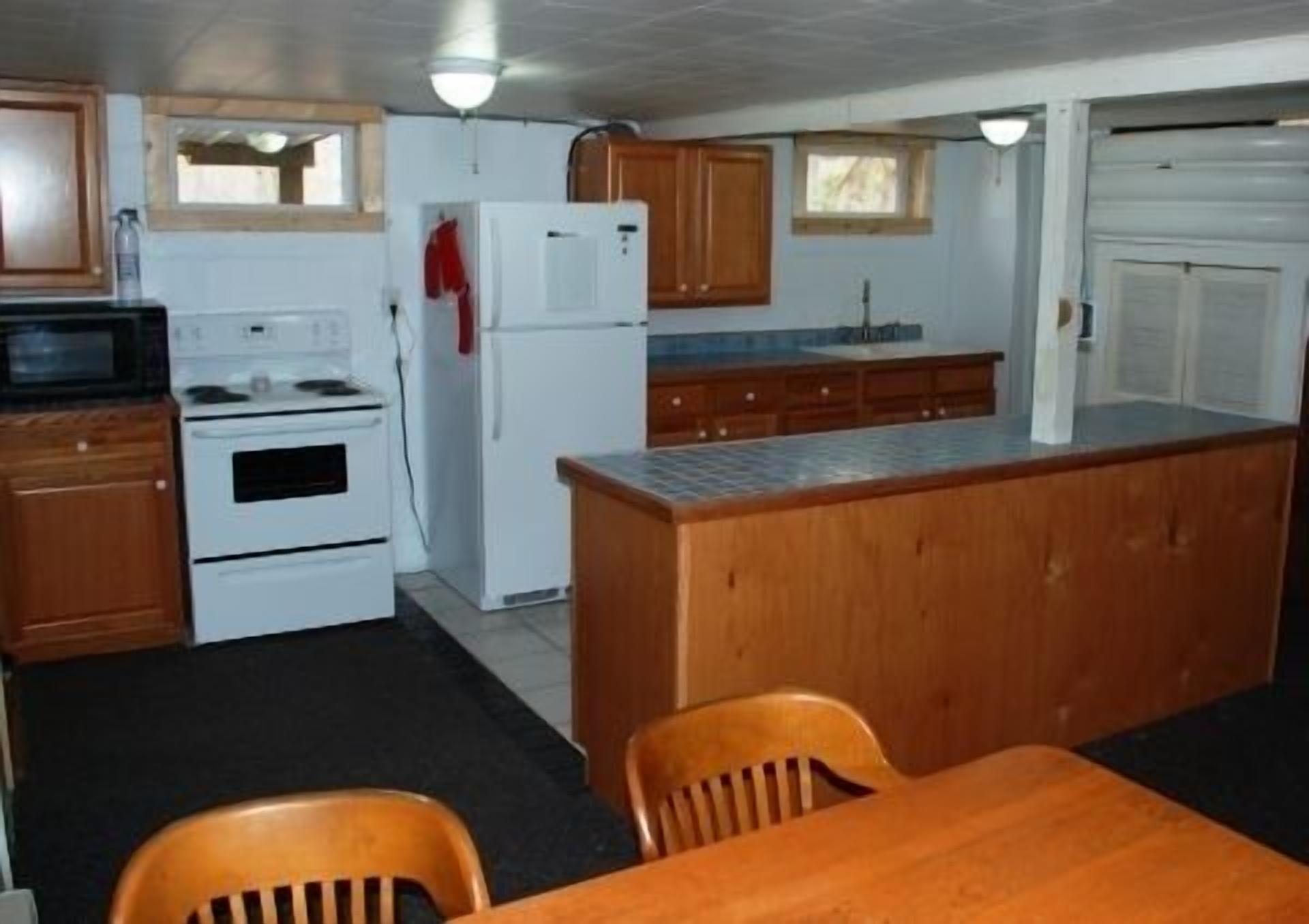 The Card's Nest Rental Cabin on Lake in Wooded Area