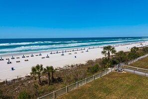 On the beach, sun loungers