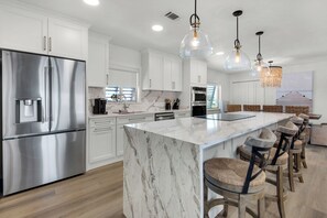 Fridge, microwave, oven, stovetop - Bare Feet Retreat 🌊 Gulf-Front Charm w/ Porch + Private Beach Walk (Pensacola Beach)