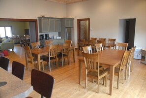 Dining area with beverage center and second refrigerator
