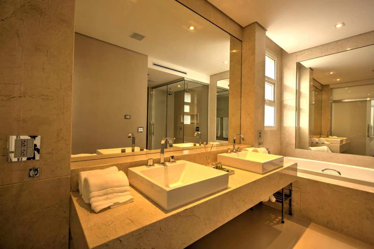 hair dryer, bathrobes, slippers, towels