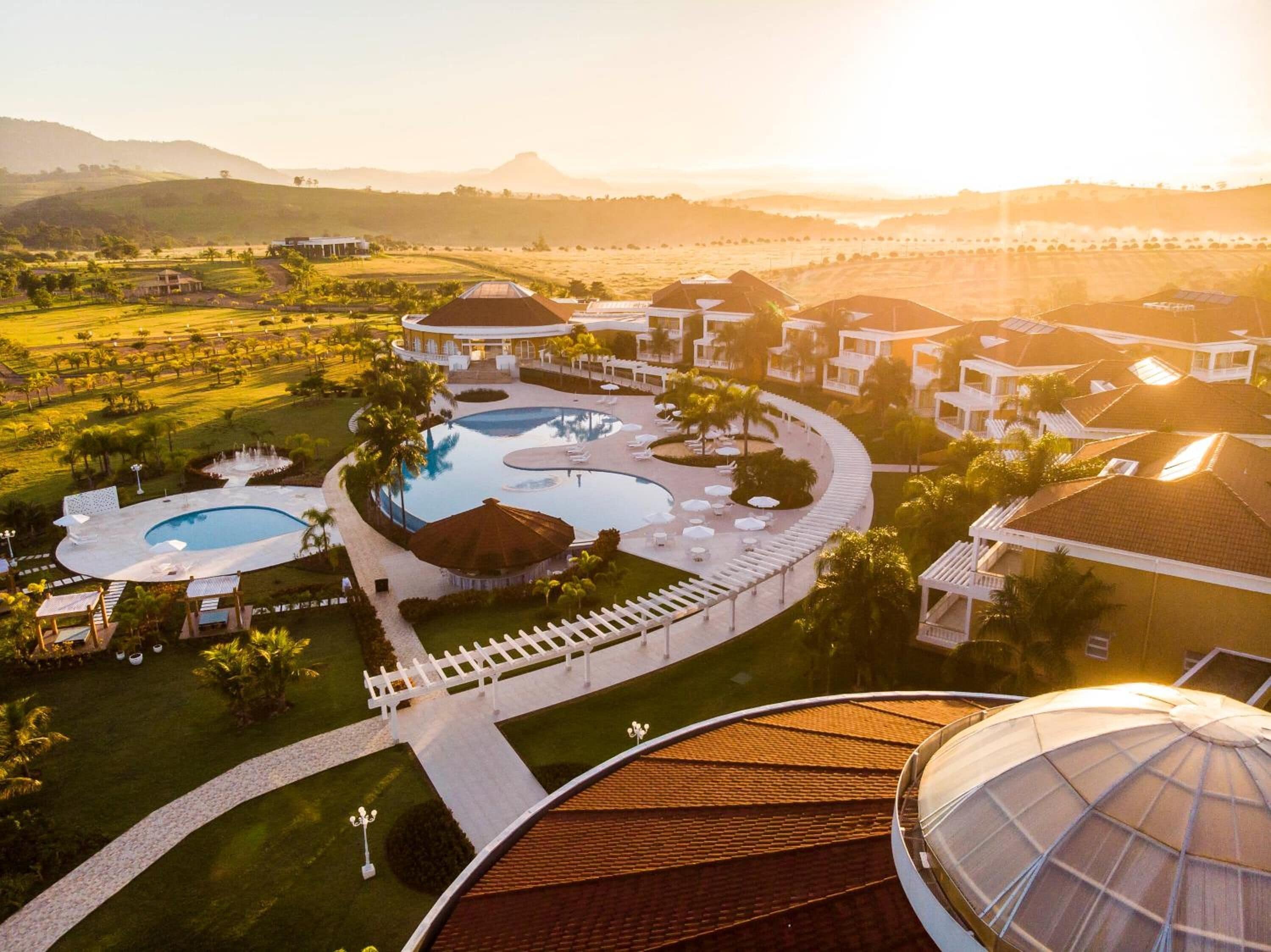 Indoor pool, outdoor pool, pool umbrellas, sun loungers