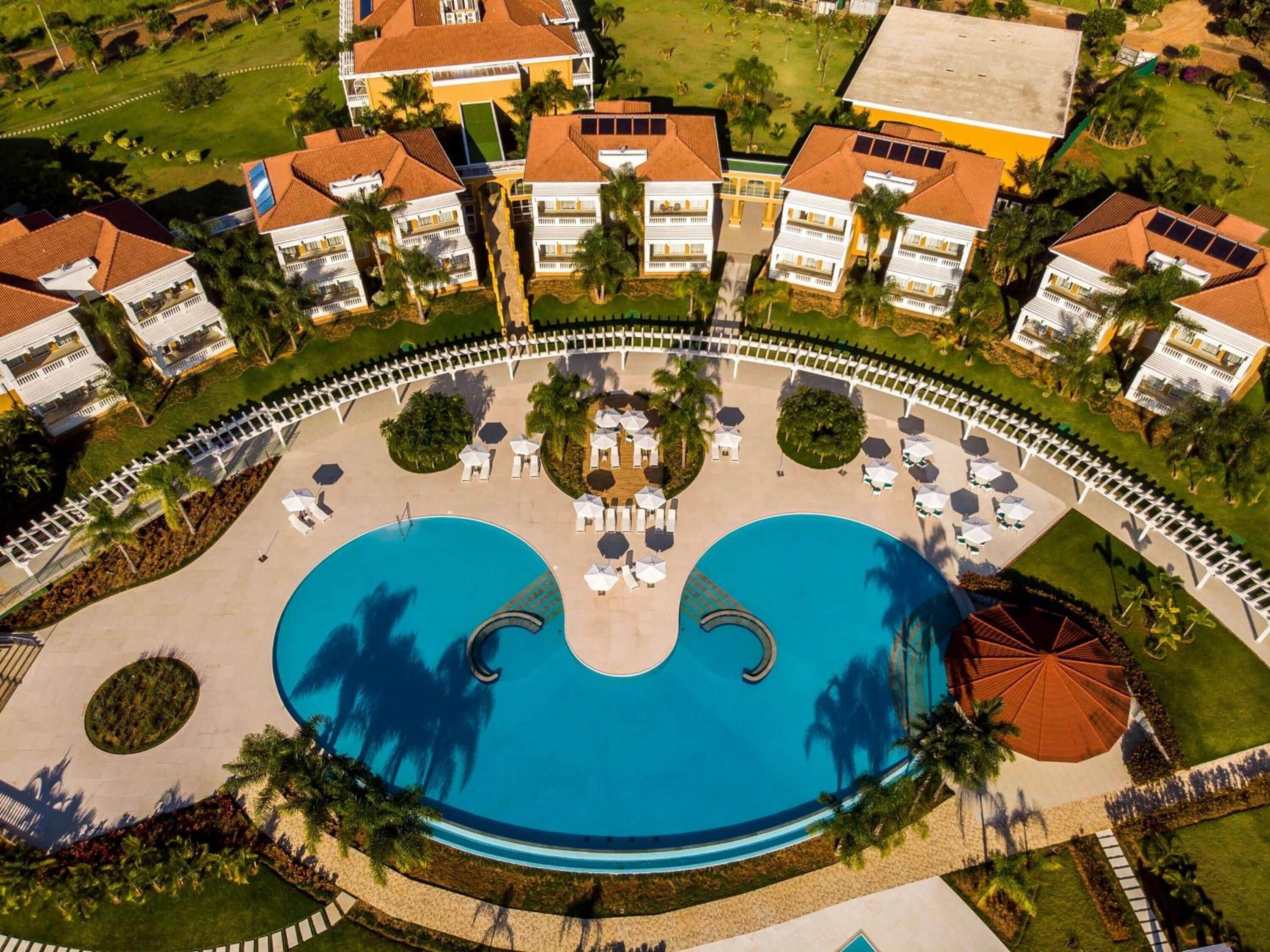 Indoor pool, outdoor pool, pool umbrellas, sun loungers