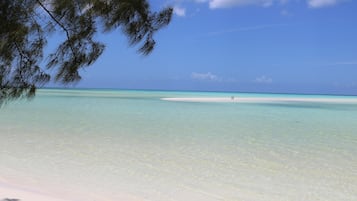 On the beach, sun-loungers, beach towels