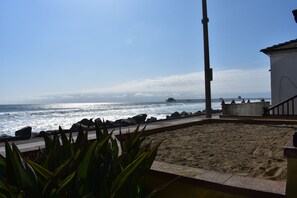 On the beach, sun loungers, beach towels