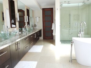 Combined shower/tub, hair dryer, towels, soap