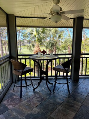 Outdoor dining - LARGE 3RD. FLOOR CORNER UNIT W/GOLF COURSE VIEWS FROM SPACIOUS WRAP AROUND LANAI (Bonita Springs)