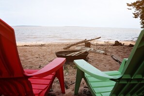 On the beach, sun-loungers, beach towels