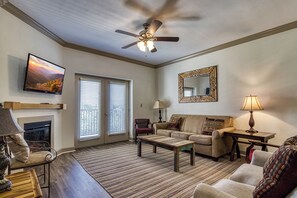 Älytelevisio, takka, DVD-soitin, videokirjasto