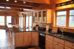 Microwave, dishwasher, coffee/tea maker, cookware/dishes/utensils