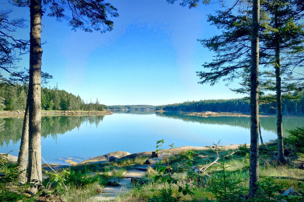 Custom-designed waterfront vacation home on 18+ acres of pristine natural beauty