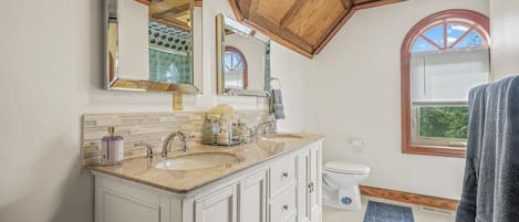 Combined shower/tub, hair dryer, towels, soap
