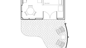Distribución de una casa de huéspedes con cocina, comedor y un pequeño salón.