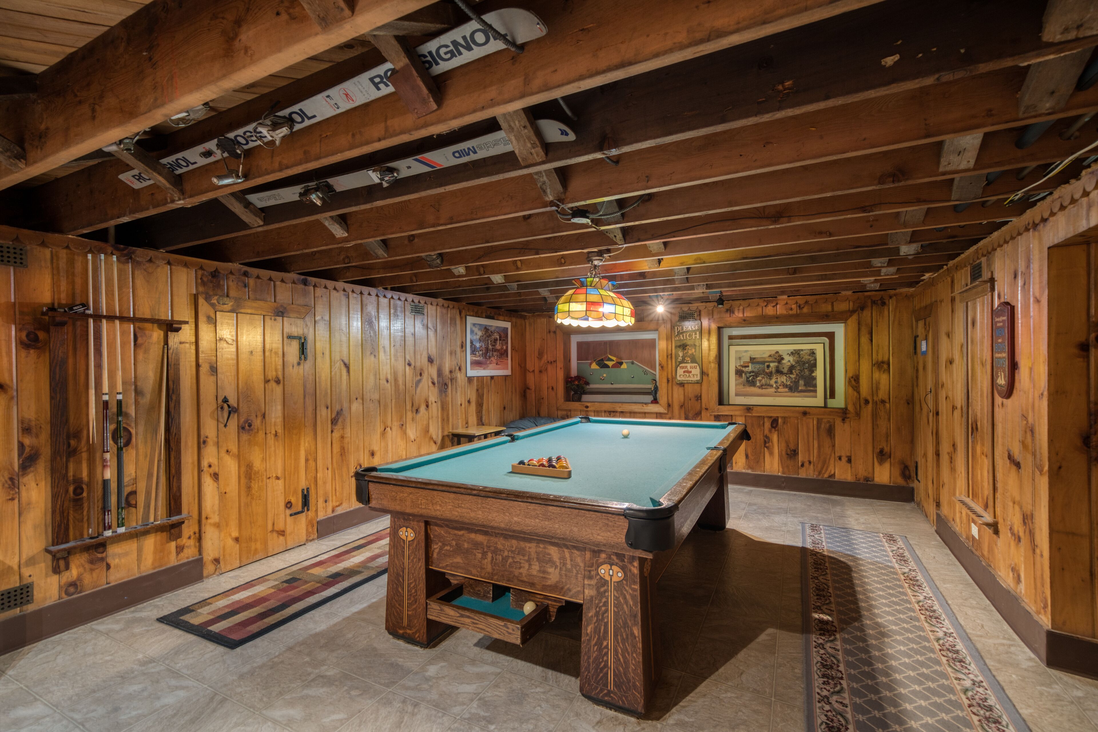 Basement pool room with our antique billiard table